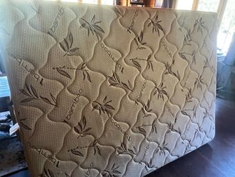 Queen mattress and wood bed frame