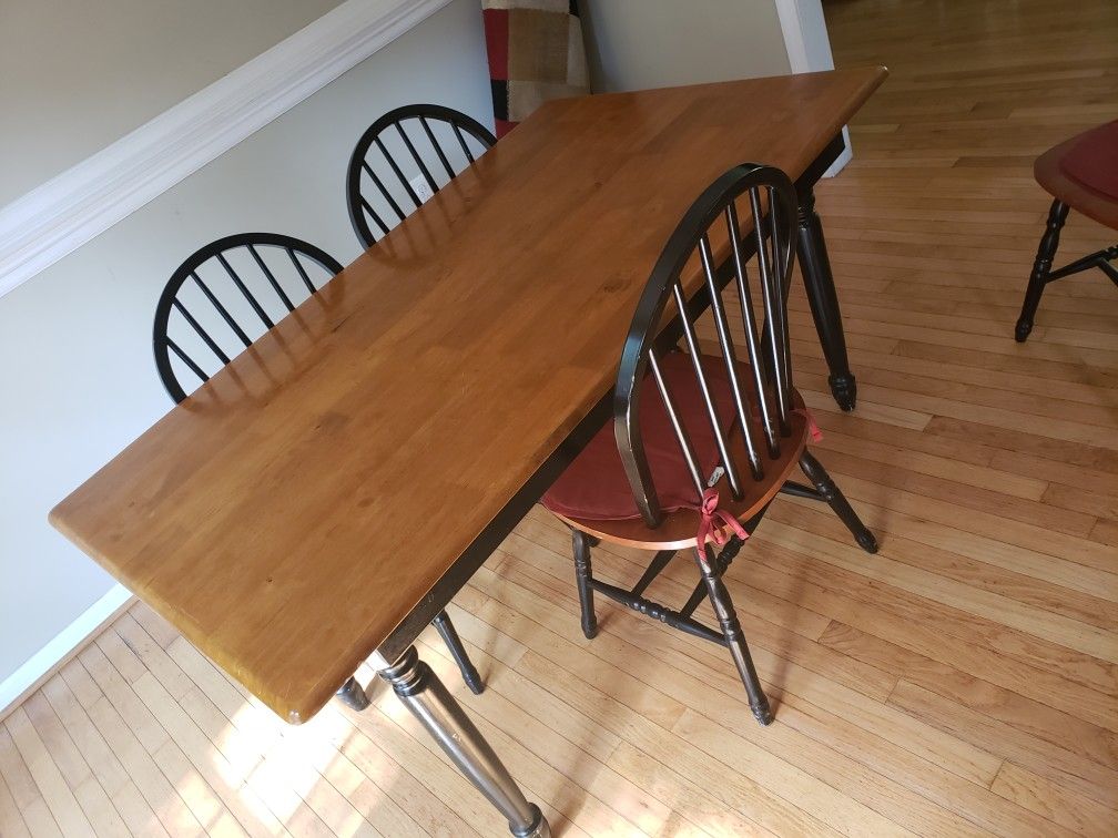 Dining room table seats 6 have 4 chairs 1 that needs repair though