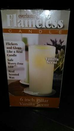 Everlasting flameless candle* 6 inch pillar* vanilla scent* New in box.