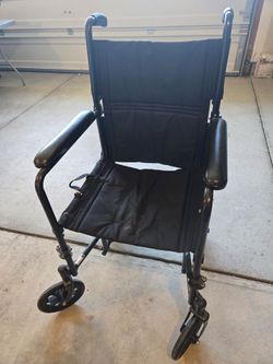 Transport wheelchair