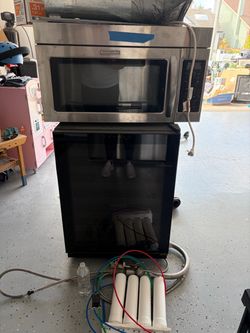 KitchenAid Over-the-Range Microwave Stainless Steel and wine fridge