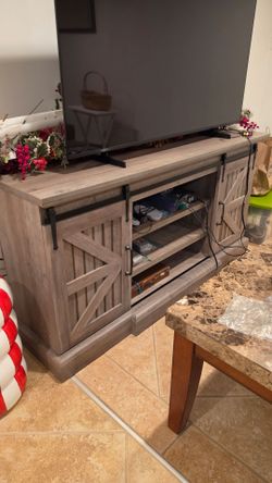 Rustic sliding door tv stand