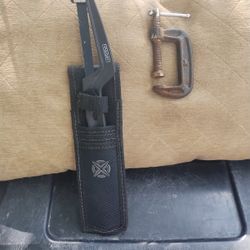 Small Wrench And Handsaw 