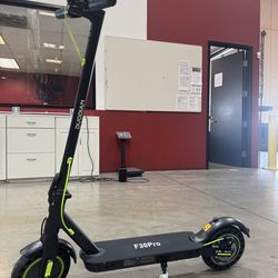 Electric scooter with shock absorption