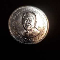 1984 commemorative coin or medal featuring President Ronald Reagan. 