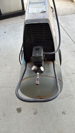Air compressor with 50’ ft. air hose $90