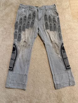 Who decides war size 38 gray jeans with black graphic of tombstones and text on the legs #tombstone