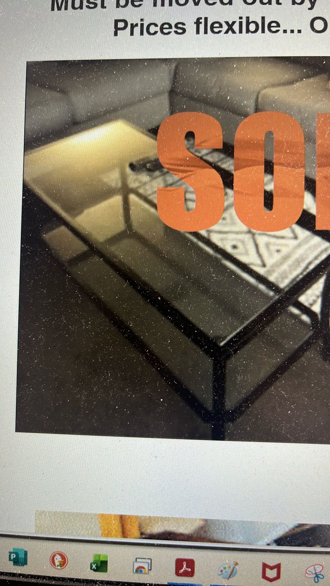 Glass And Black Framed Coffee Table $40