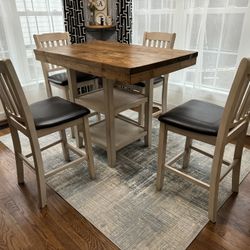 Wooden counter height table with 4 chairs