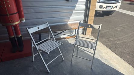 White Folding Chairs.