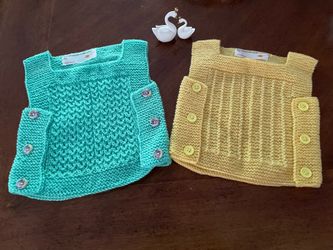 Hand knit woolen baby vest
