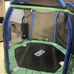 Sportspower Outdoor My First Kids Trampoline with Safety Enclosure Net and Foam Pad, 7FT Round - Blue/Green