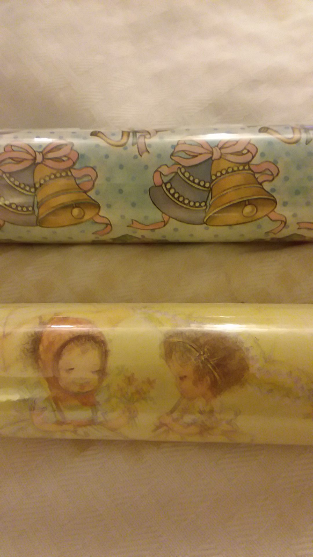 Two rolls of vintage bridal shower gift wrap