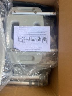 New in box toilet seat commode