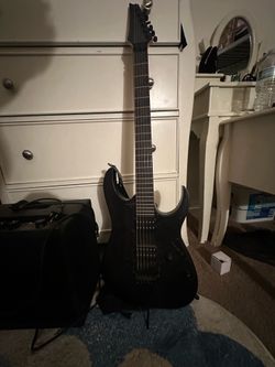 Gio Ibanez 6 string electric guitar with fender amp