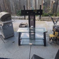 TV Stand And 2 Bicycles $60