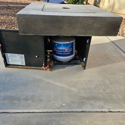 Outdoor fire pit with propane tank