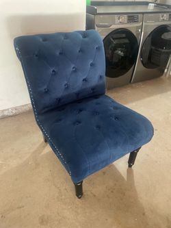 Blue single seater couch