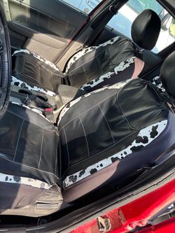 Cow print seat covers