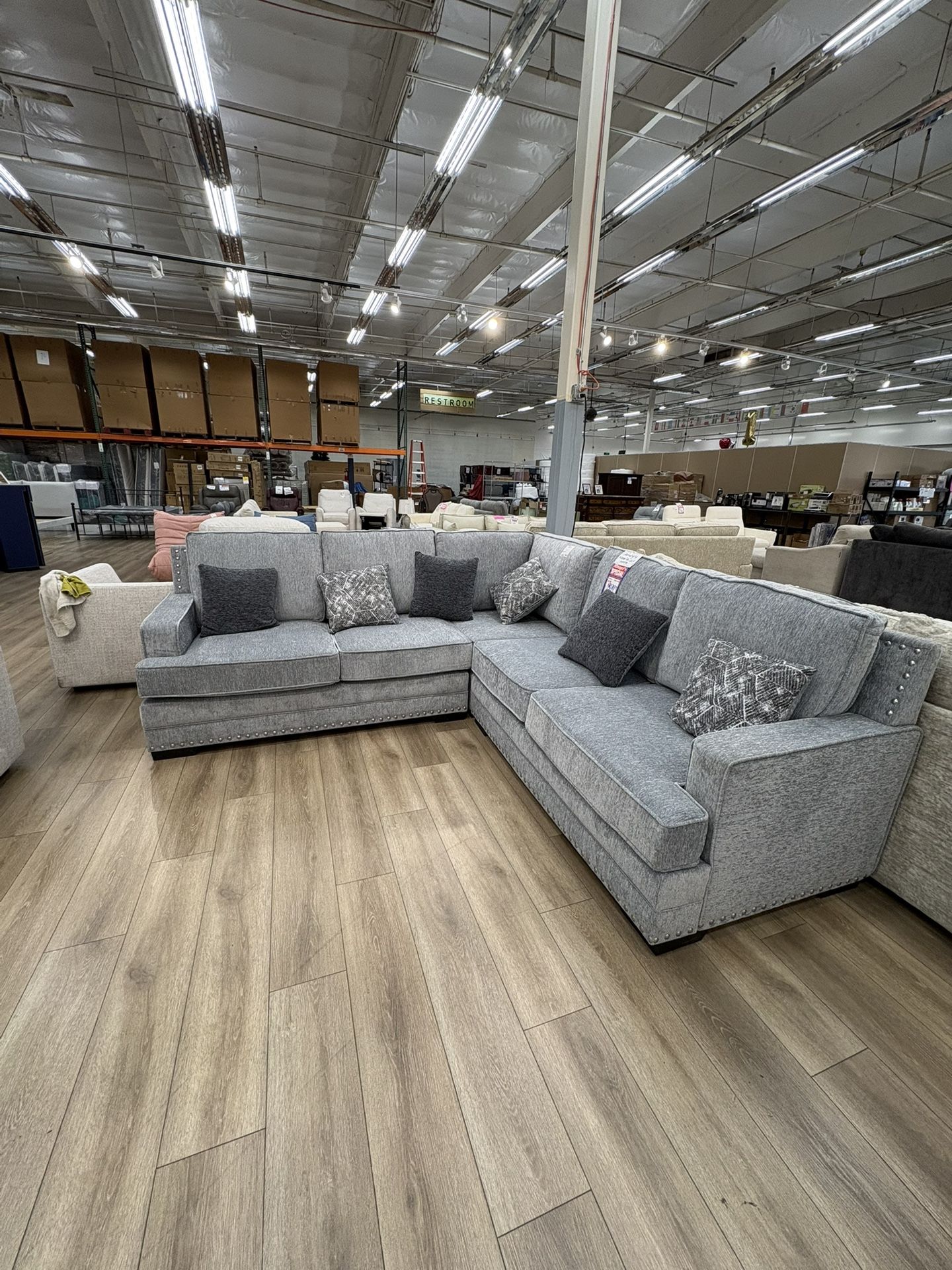 New Light Gray Sectional With Accent Pillows