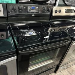 Whirlpool black electric stove with warranty