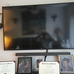 55" LG flat Screen With Speaker Bar Woofer And Combination DVD player And Recorder