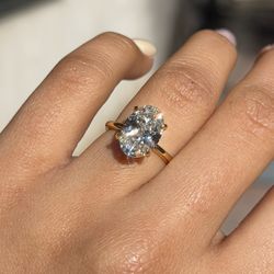 Oval solitaire diamond engagement ring