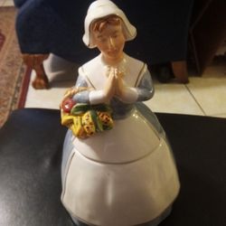 Praying Pilgrim Lady Cookie Jar.