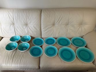 set of Nicole Miller Turquoise Dinner Plates featuring a vibrant aqua crackle glaze finish.