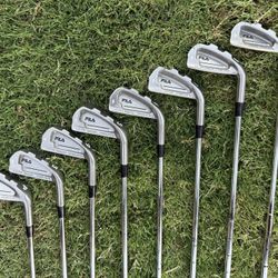 Fila right hand golf clubs iron set 3-9 and pitching wedge, steel shaft, regular flex, new grips