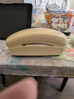 Wall sign, princess phone, 49er tape