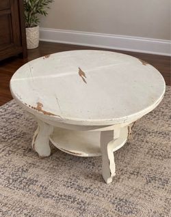 Round Distressed White Coffee Table with Shelf