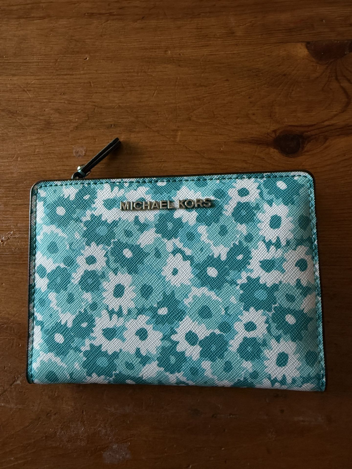 Michael Kors wallet with a floral pattern