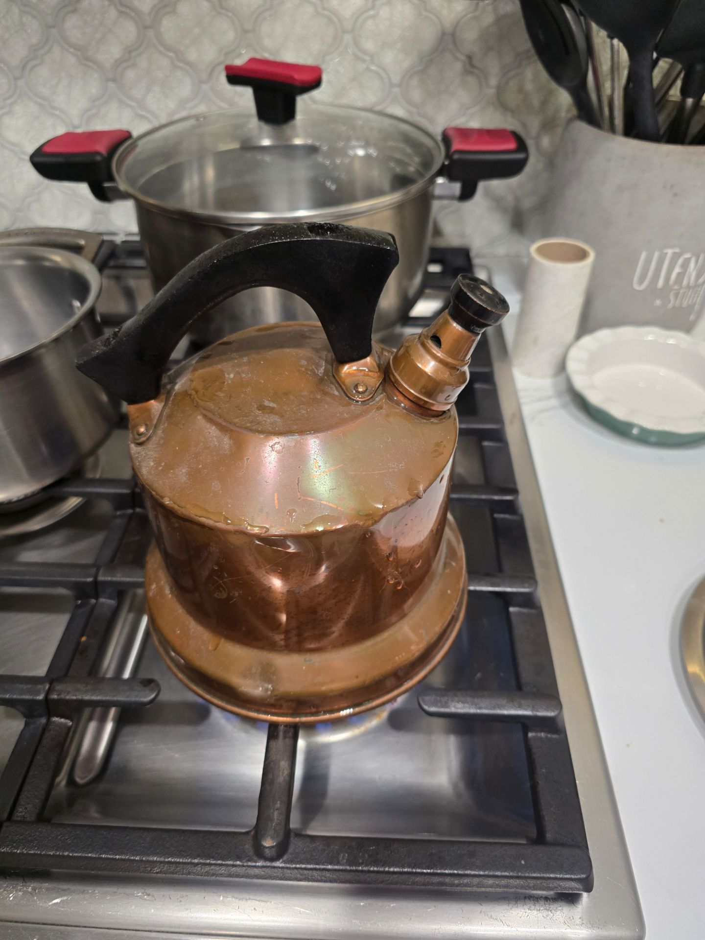 Vintage whistling brass tea pot