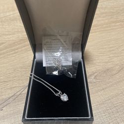 Silver set: necklace & earrings with a heart shape stones