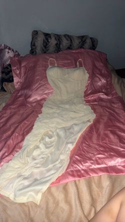 Medium off white stretchy long dress with a slit on the bottom