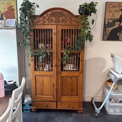 This vintage   wood armoire