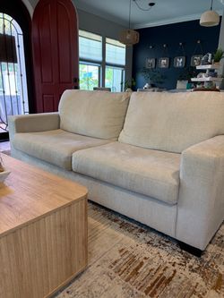 White sofa and love seat
