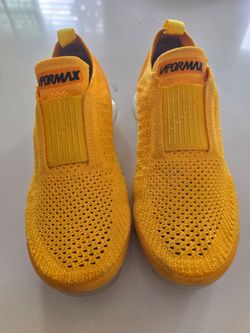Nike  yellow  💛  size  6