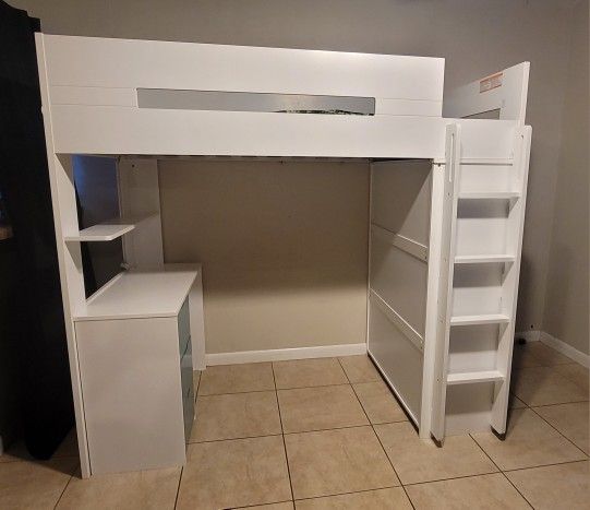 Kids loft bed with desk and cabinet attached