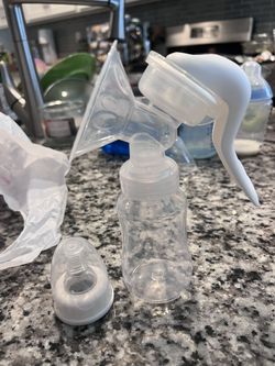 manual breast pump / bottle