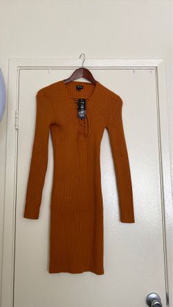 Cute fall dress new with tag size M/L very stretchy