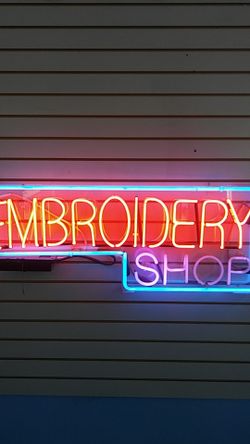 Neon Embroidery shop sign