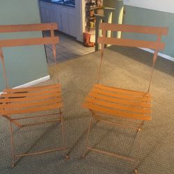Orange Metal Bistro Chairs