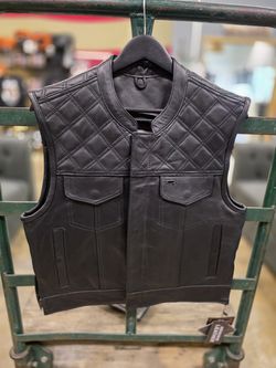 Leather vest with diamond stich upper panel $185 FIRM