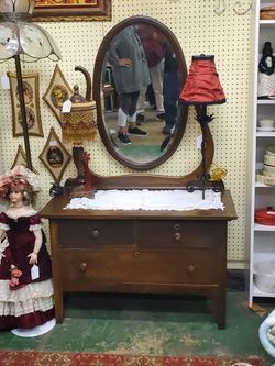 Antique Dresser With Oval Mirror $200.00