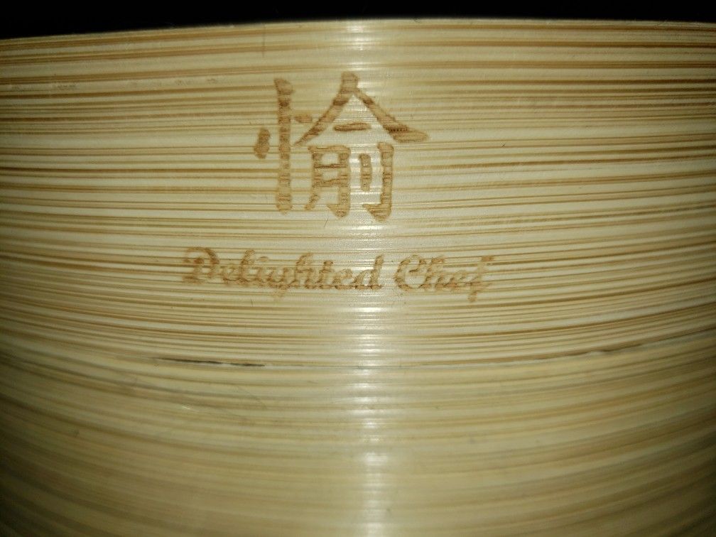Delighted chef bamboo steamer