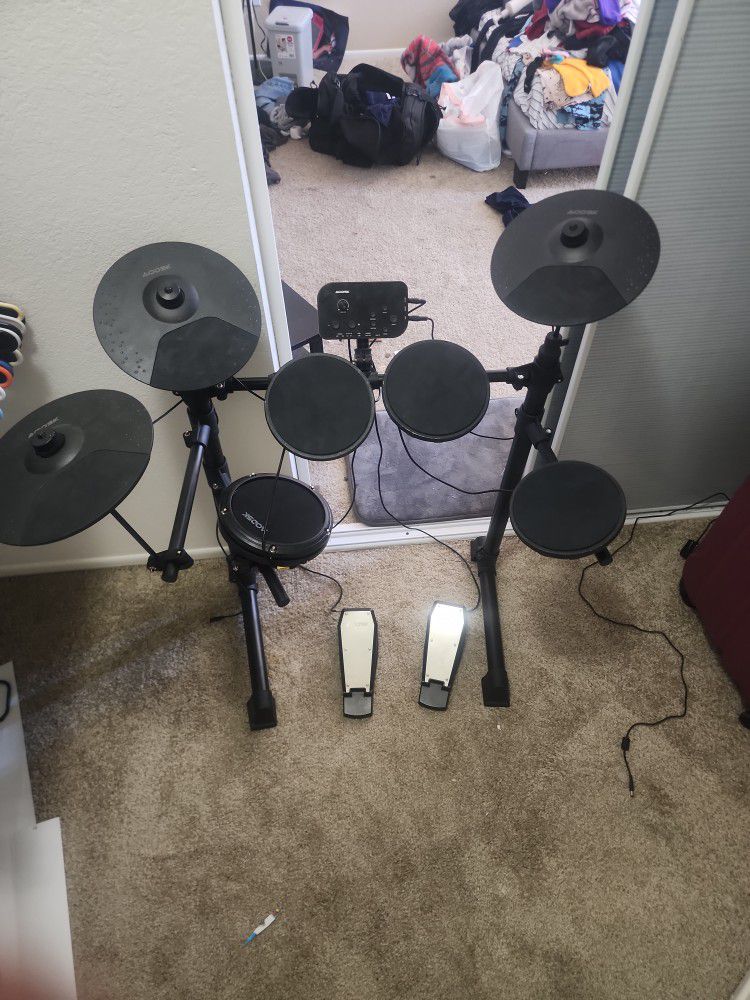 1 Electric Drumset And 1 5 Peice Drum Set $200