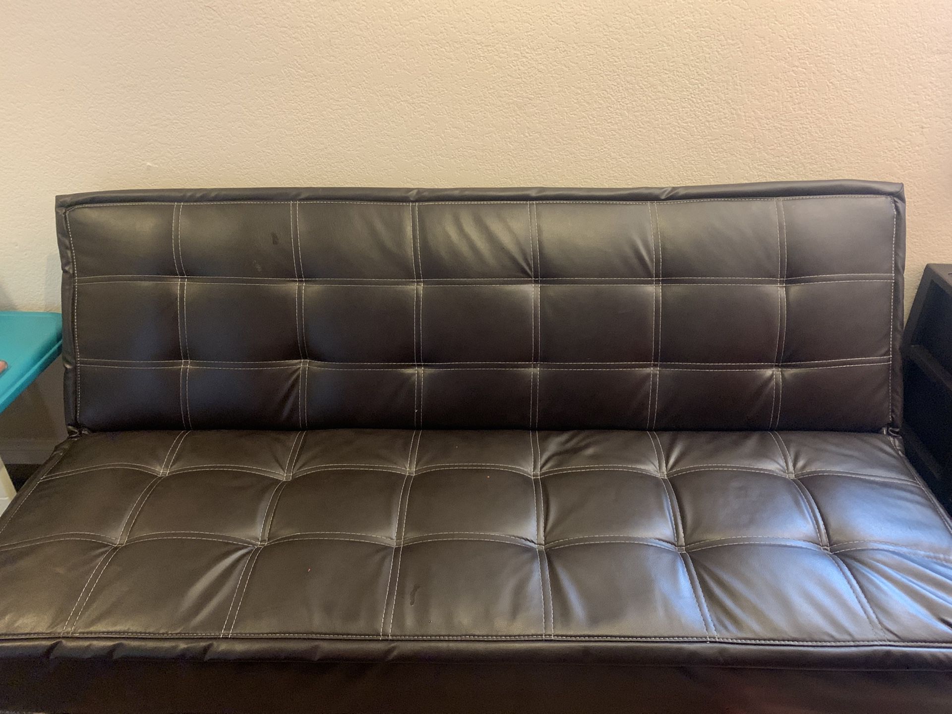 Brown leather futon