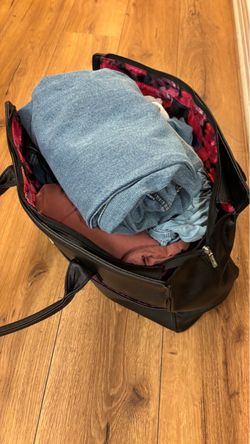 Bolsa con ropa talla s